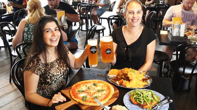 Rita Challita and Natasha Blom raise a glass to the food at The Bavarian in Penrith. Picture: Bob Barker