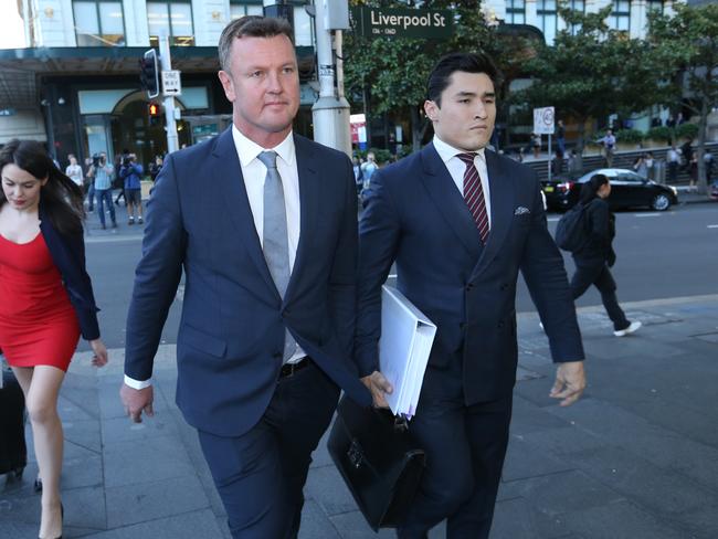 Anthony Bell arrives at court with his solicitor Bryan Welch during a hearing into an application for an AVO.