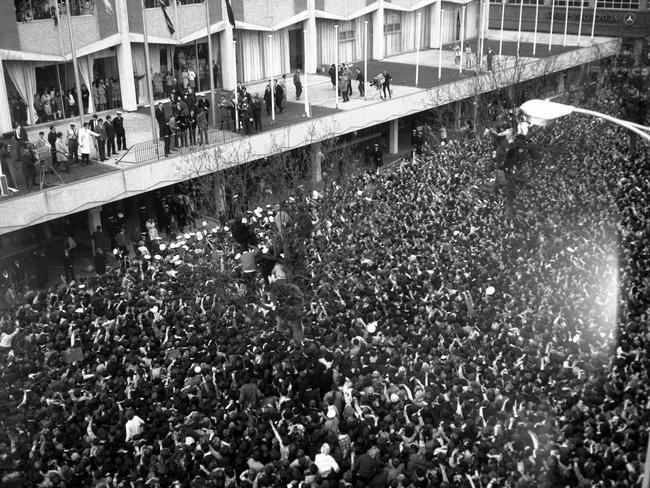 June 14, 1964: Fans flock to the Southern Cross Hotel where the band appeared on the balcony. Picture: Herald Sun Image Library