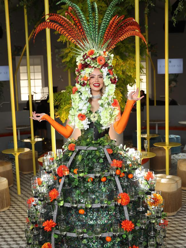 Mikaela Jade Schreuder wearing a champagne dress inside 1 Oliver St marquee. Picture: Alex Coppel