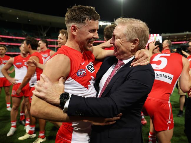 Jake Lloyd celebrates with Sydney Swans chairman Andrew Pridham after defeating GWS in the first preliminary final. Picture: Cameron Spencer/Getty Images.