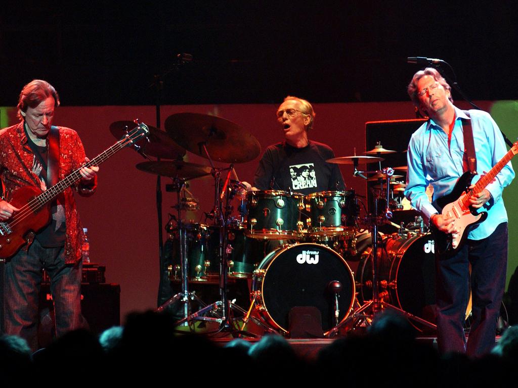 Jack Bruce, left, with Ginger Baker, centre, and singer Eric Clapton, right, during a Cream reunion concert at Royal Albert Hall in London in 2005.