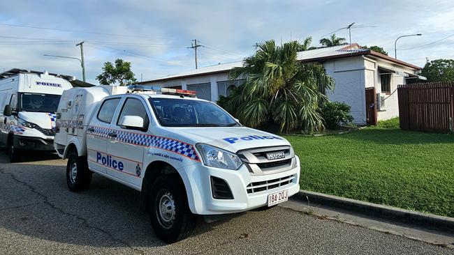 Police one scene at an alleged arson on Bailey St, Gulliver. Picture: Natasha Emeck