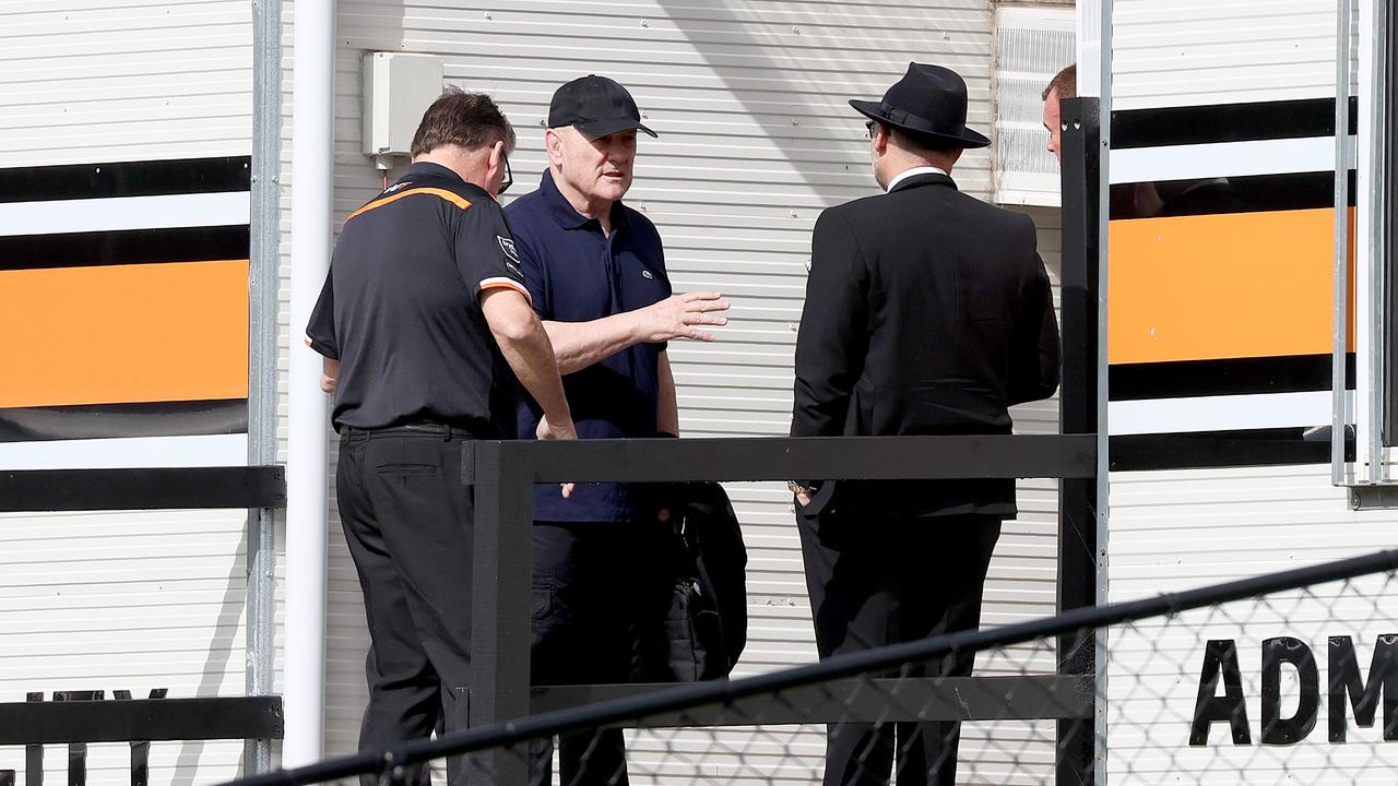 Tim Sheens (middle) arrives for his first day as the Wests Tigers director of football. Picture: Toby Zerna