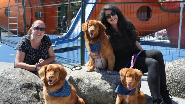 Julia Eppingstall and sister Lauren Griffiths with the Nova Scotia dogs. Picture: Dawn Fougere