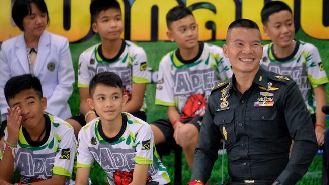 Twelve boys from the "Wild Boars" soccer team and a Thai Navy SEAL speak during a press conference for the first time since they were rescued from a cave. Picture: Linh Pham/Getty Images