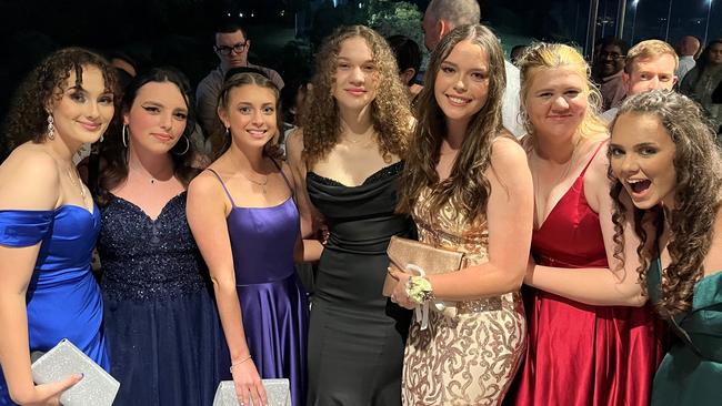 The glamorous crowd at the golf club.
