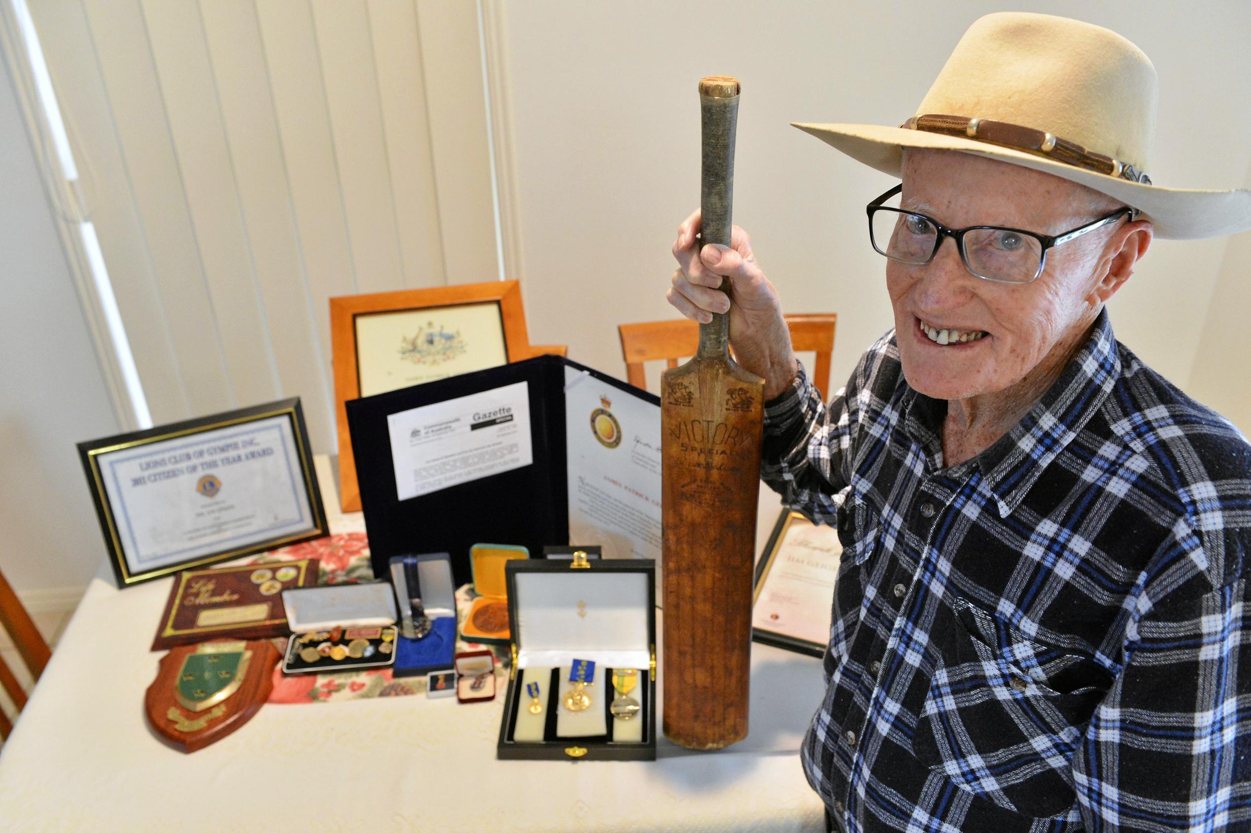 Gympie Southside resident, 92 year old (93 in September 2015) Mr Jim Geiger. Photographed with his trusty bat that made him 1004 runs in the 1957 cricket season. Photo Greg Miller / Gympie Times. Picture: Greg Miller