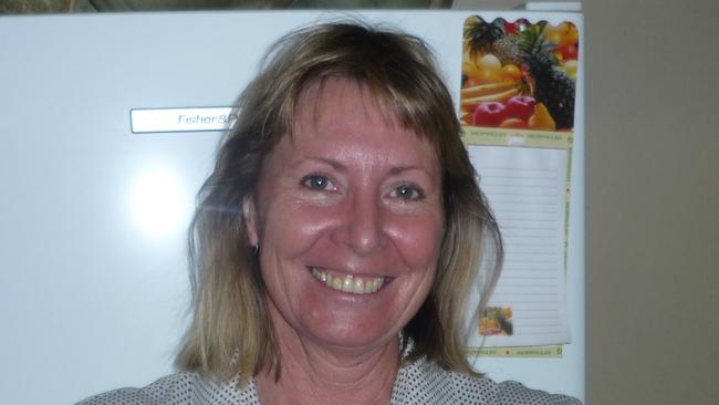 Gayle Woodford with watermelons from the garden she planted around the nurses quarters . Picture: Supplied by family