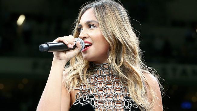 Jessica Mauboy sings Advance Australia Fair in an empty ring at the Anthony Mundine-Danny Green fight. Picture Sarah Reed