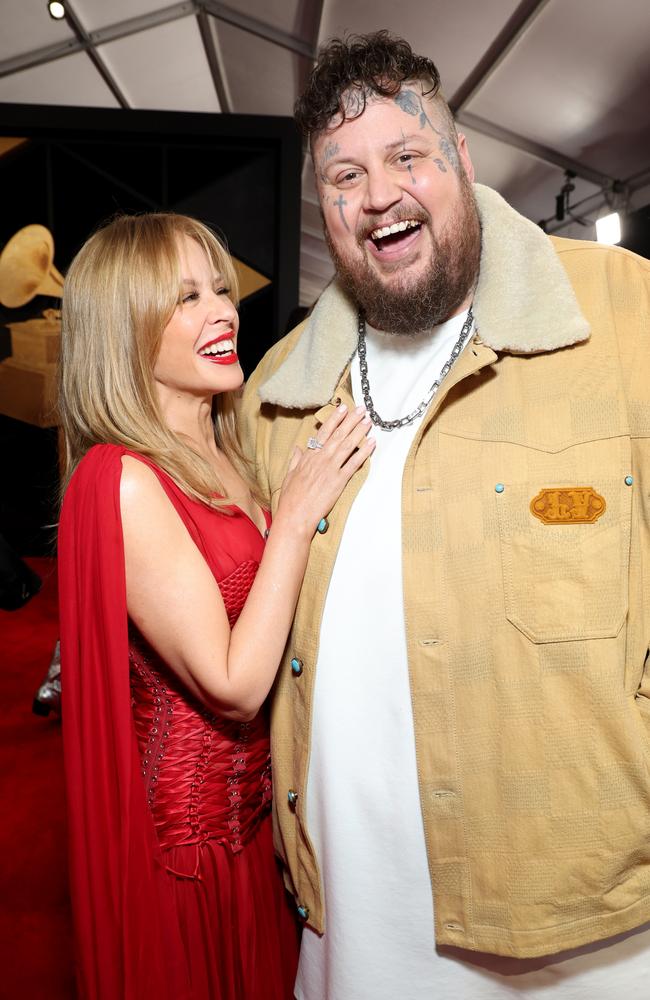 Kylie Minogue beams as she poses with rapper Jelly Roll on the red carpet. Picture: Getty Images