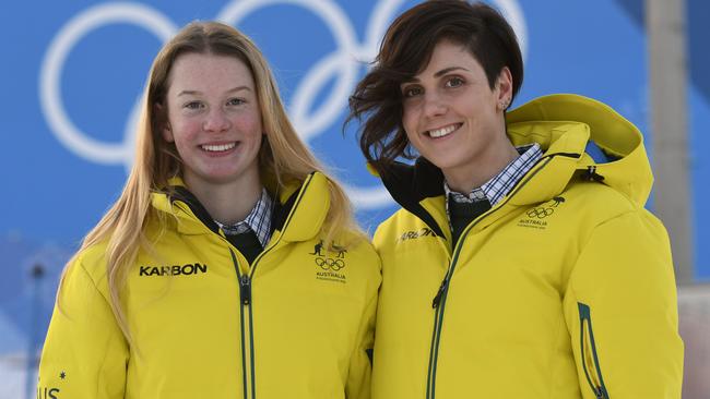 Tess Coady with aerial skier — and Australia’s flag-bearer — Laura Peel at the 2018 Winter Olympics. Picture: Steve Cuff