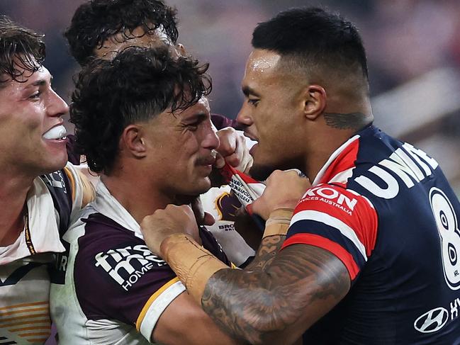 LAS VEGAS, NEVADA - MARCH 02: SpencerÂ Leniu (r) of the Roosters exchanges heated words with KotoniÂ Staggs of the Broncos during the round one NRL match between Sydney Roosters and Brisbane Broncos at Allegiant Stadium, on March 02, 2024, in Las Vegas, Nevada.   Ezra Shaw/Getty Images/AFP (Photo by EZRA SHAW / GETTY IMAGES NORTH AMERICA / Getty Images via AFP)