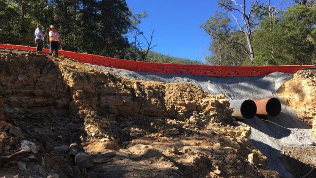 Access has been restored to Springbrook after a 5m chasm opened up following ex tropical cyclone Debbie Photo: Mark Bailey