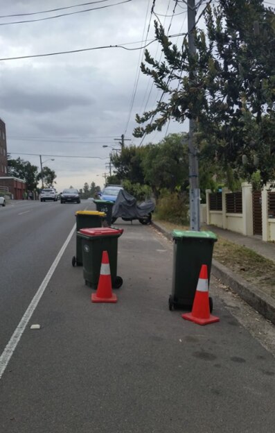 As if parking isn't hard enough already, people are blocking off sections of the street with no explanation.