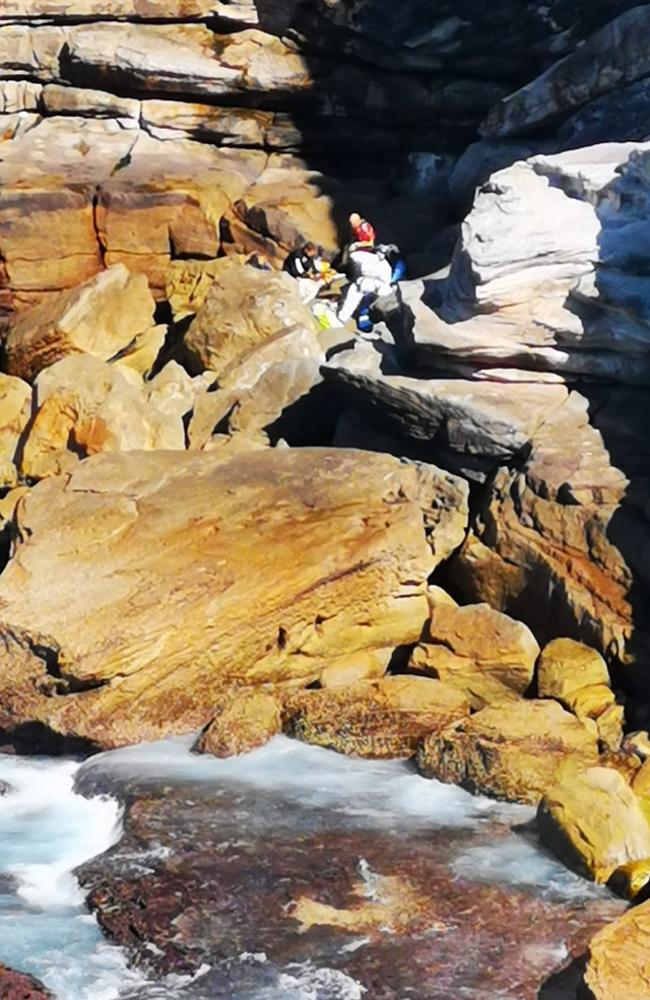 It’s believed the woman fell from one platform onto another far below.