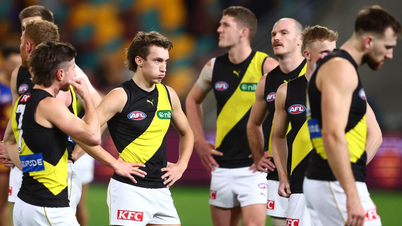 The Tigers leave the field (Photo by Chris Hyde/AFL Photos/via Getty Images)