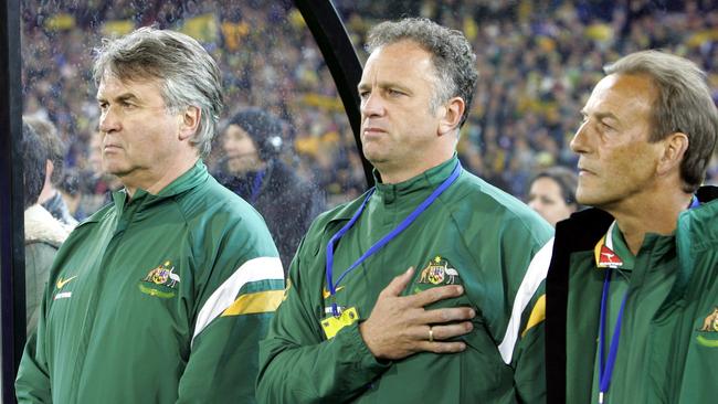 Former Socceroos coach Guus Hiddink (left) with then assistant coach Graham Arnold during 2006.