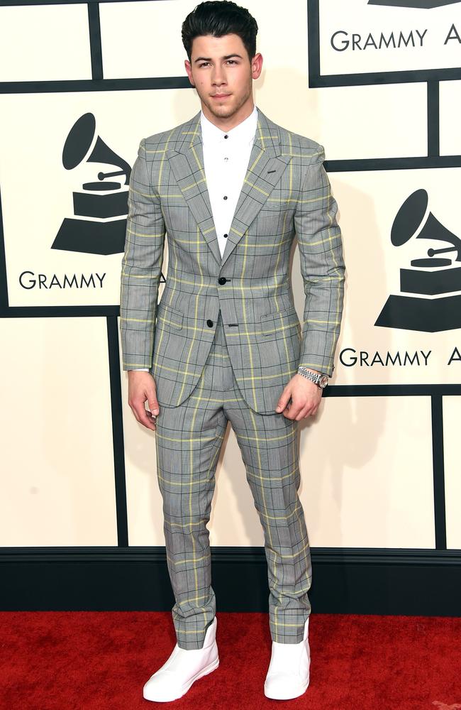 Nick Jonas opted for a grey, yellow, white and black suit. Hmmm ...