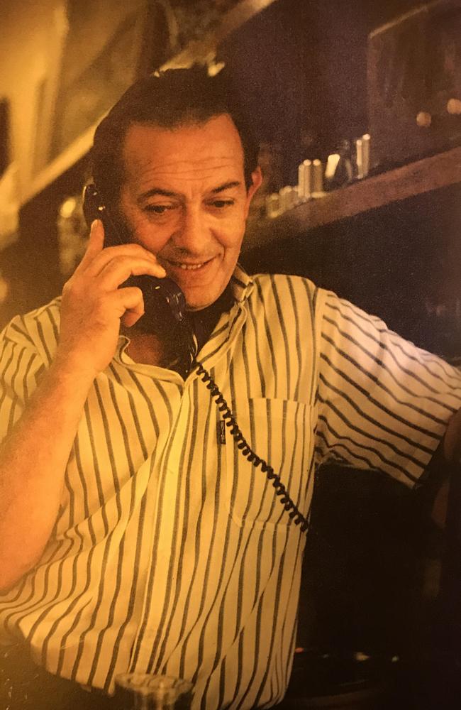 Sisto Malaspina on the phone at Pellegrini’s.