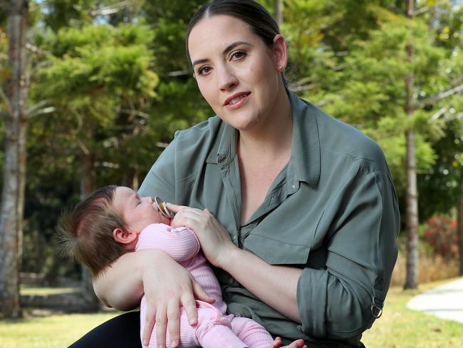 Chloe Aitken, 32, with daughter Everly, 5 weeks-old, who was accidentally born at home, Springfield. Young mothers in the Greater Springfield region are being forced to travel up to 45 minutes to access maternity care. Photographer: Liam Kidston.