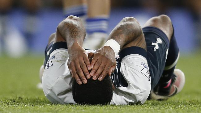 Tottenham's Danny Rose puts his hands over his face.