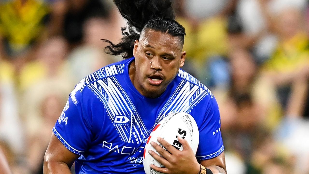 TOWNSVILLE, AUSTRALIA - OCTOBER 14: Luciano Leilua of Samoa runs the ball during the Mens Pacific Championship match between Australia Kangaroos and Samoa at Queensland Country Bank Stadium on October 14, 2023 in Townsville, Australia. (Photo by Ian Hitchcock/Getty Images)