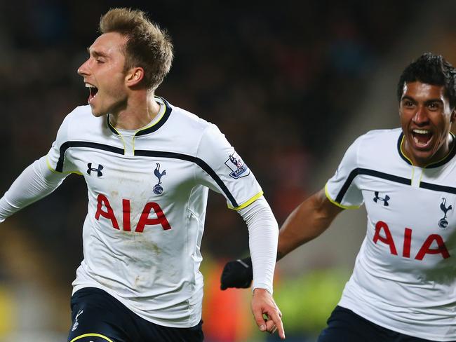 HULL, ENGLAND - NOVEMBER 23: Christian Eriksen of Tottenham Hotspur celebrates scoring the winning goal with Paulinho during the Barclays Premier League match between Hull City and Tottenham Hotspur at KC Stadium on November 23, 2014 in Hull, England. (Photo by Alex Livesey/Getty Images)