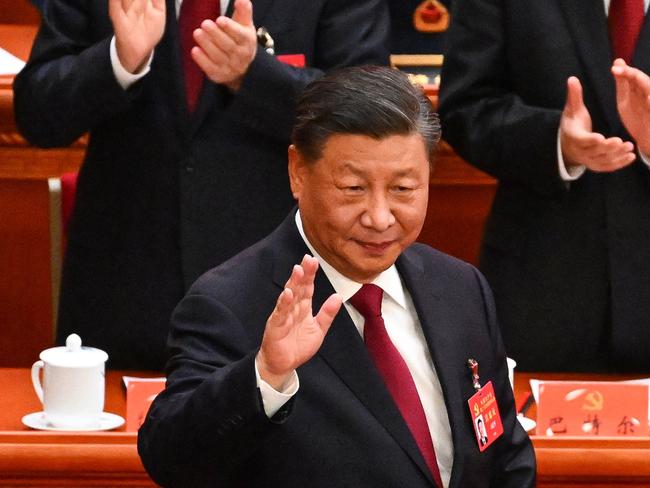 TOPSHOT - China's President Xi Jinping arrives for the opening session of the 20th Chinese Communist Party's Congress at the Great Hall of the People in Beijing on October 16, 2022. (Photo by Noel CELIS / AFP)