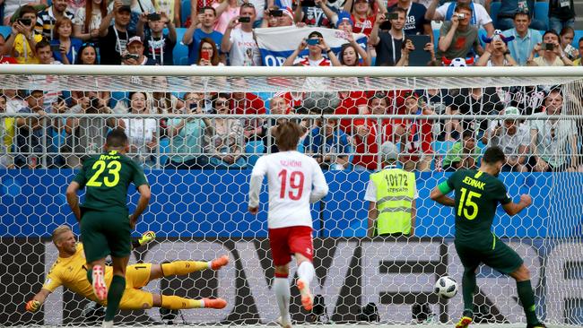 Mile Jedinak scores the penalty that gave the Socceroos a draw against Denmark. Picture: Toby Zerna