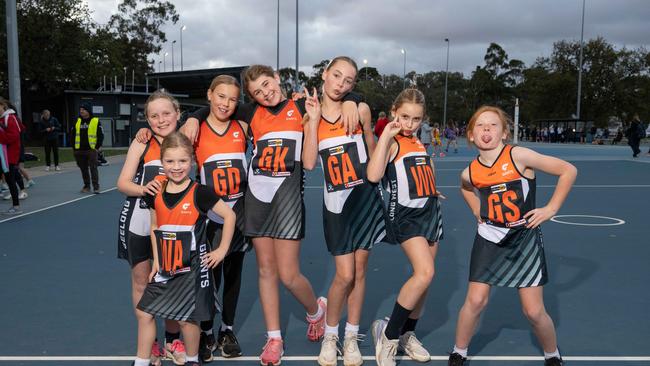 Geelong West Giants under-11 netball team pull their funniest faces.