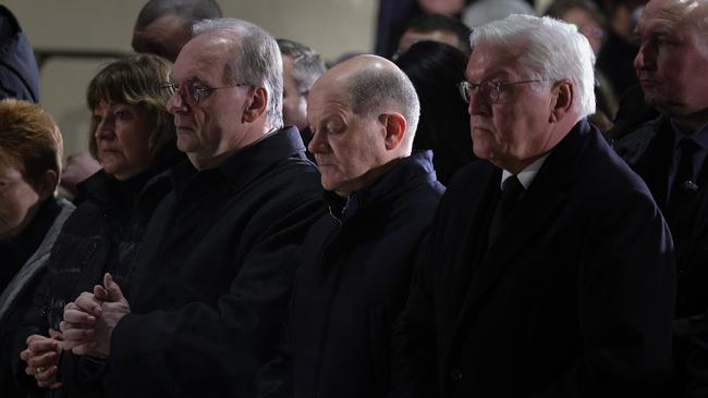 Right to left: German President Frank-Walter Steinmeier, German Chancellor Olaf Scholz and Saxony-Anhalt state Premier Reiner Haseloff during a prayer ceremony at the Magdeburg Dom church. Picture: Getty