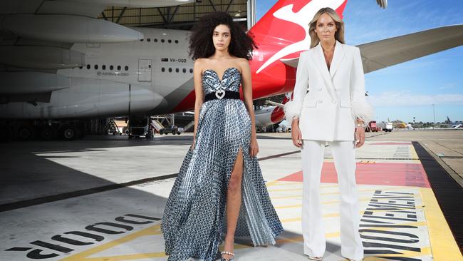 Rebecca Vallance and model Beatrys wearing her designs on the tarmac at Sydney airport. Picture: John Feder; Stylist: Emma Kalfus; Production: Charlotte Rose; Hair: Di Gorgievski; Make-up: Chantelle Baker