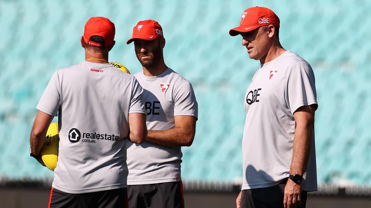 John Longmire with assistant coaches. (Photo by Cameron Spencer/Getty Images)