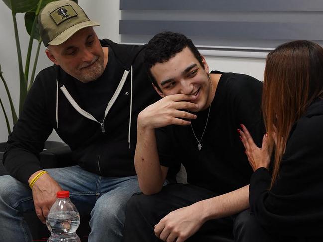 Edan Alexender reunites with members of his family after 584 days in captivity. Picture: AFP