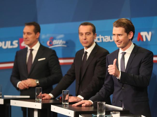 Sebastian Kurz (R), Christian Kern, (C) Austrian Chancellor and leader of the Austrian Social Democrats (SPOe) and Heinz-Christian Strache, lead candidate of the right-wing Austria Freedom Party (FPOe) give television interviews following Austrian parliamentary elections.