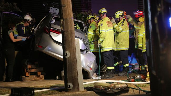 Emergency services at the scene of the car crash on the corner of Crawford Road and President Ave. Picture: Christian Gilles