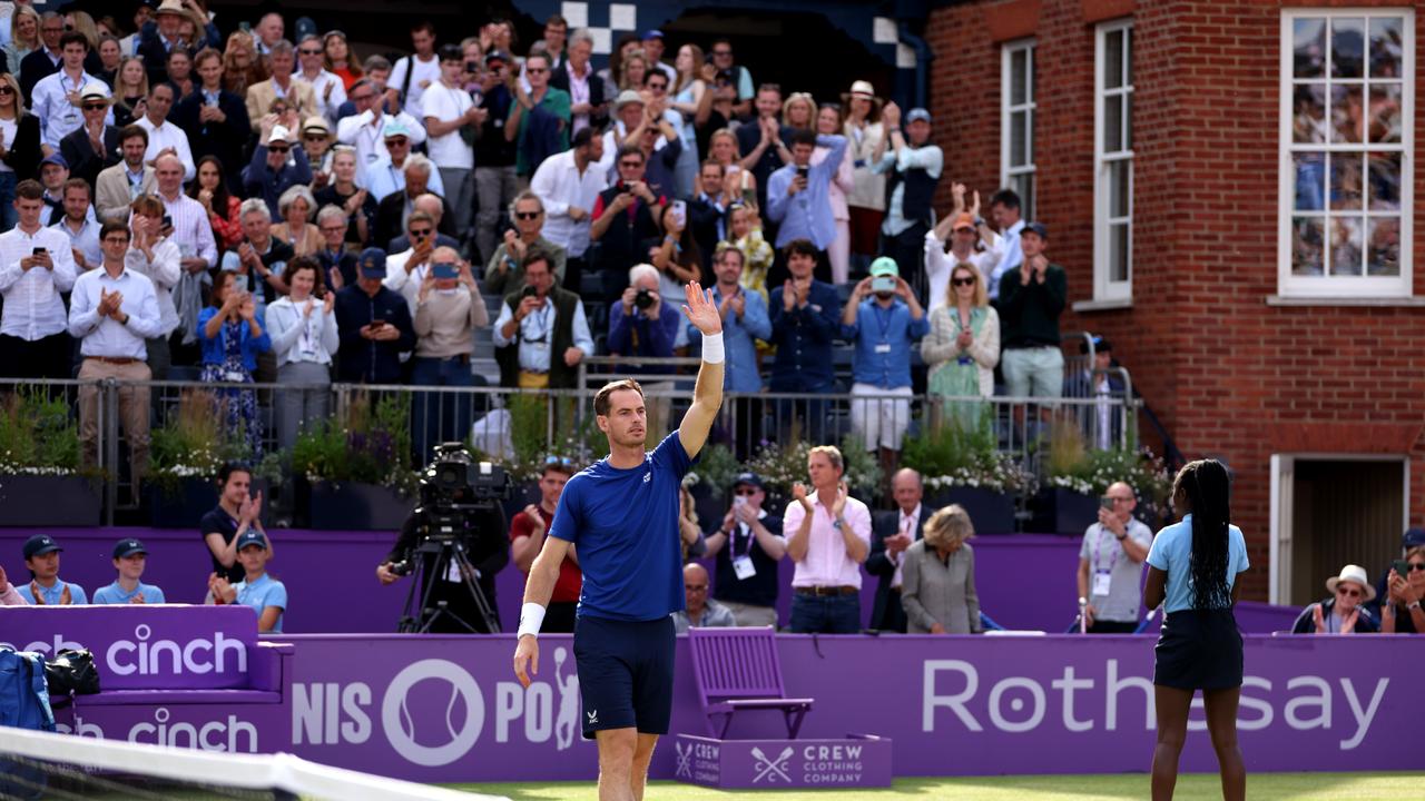 Andy Murray of Great Britain acknowledges the fans as he is forced to pull out of the match due to injury. (Photo by Clive Brunskill/Getty Images)