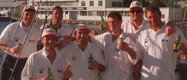 The crew of AFR Midnight Rambler celebrate their handicap win in 1998. Picture: Ian Mainsbridge