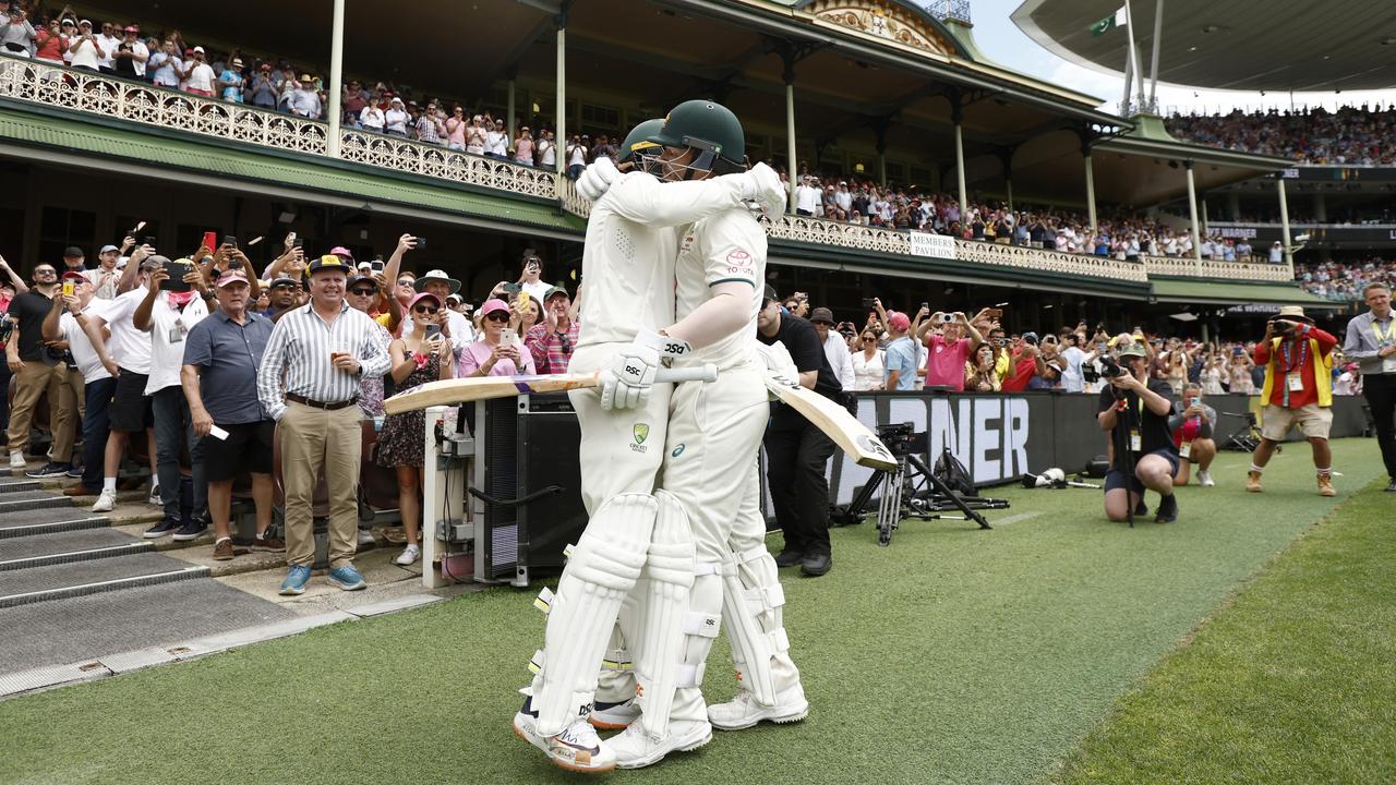 Usman Khawaja and David Warner embrace before Warner's last test match innings. (Photo by Darrian Traynor/Getty Images)