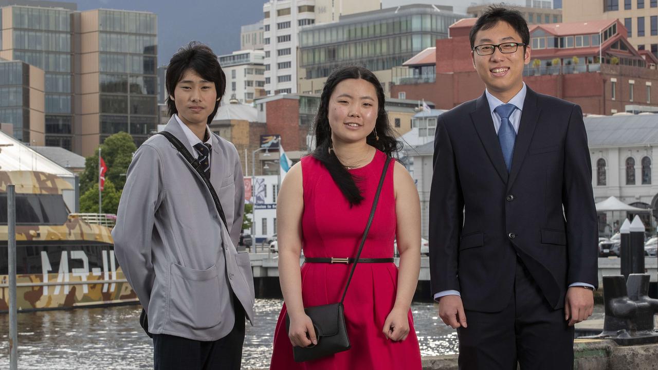 Hobart College leavers Dinner 2021 at the Hobart Function and Conference Centre, Takahito Kakiuchi, Meika Zygmant and Zhen Ma. Picture: Chris Kidd