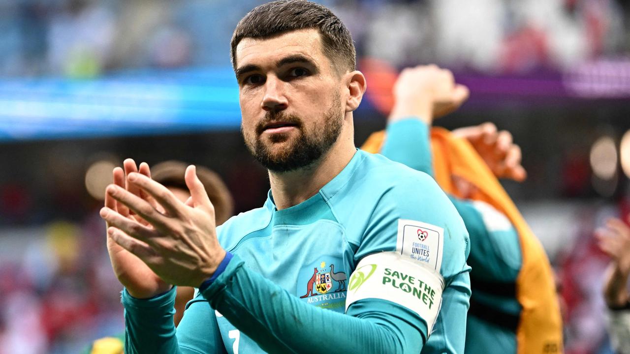 Mathew Ryan celebrates after the win over Tunisia.