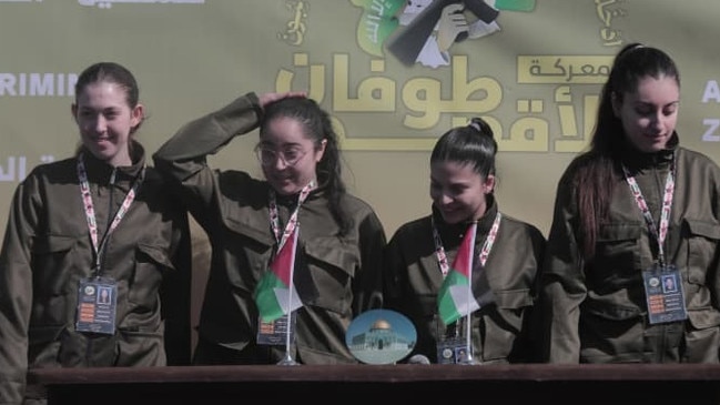 Hamas released four female Israeli soldiers in Gaza on Saturday after walking them across a stage. Picture: Moamen Qreiqea/Zuma Press