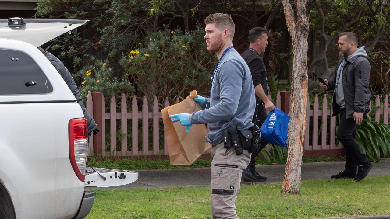 Police bagging evidence after the Ranger was dumped. Picture: Brad Fleet