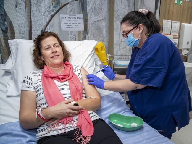 A volunteer receives her first dose of a COVID-19 vaccine created by scientists from UQ in 2020. It was phase one of the study, held at the Brisbane campus of the Nucleus Network. Picture: NCA NewsWire/Supplied