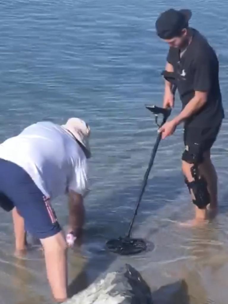 Locals look for Peter Wynn's premiership ring.