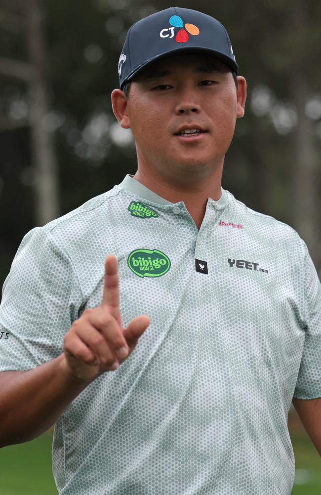 Si Woo Kim after his hole-in-one on the sixth hole. Picture: Andrew Redington/Getty Images