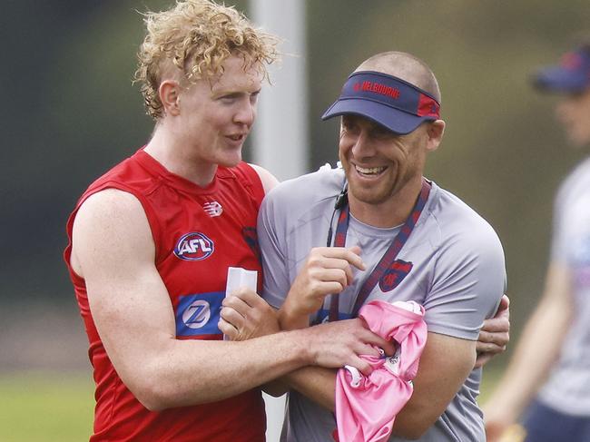 Simon Goodwin has a laugh with Clayton Oliver at Demons training. Picture: Getty Images