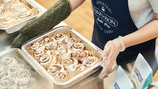 Queensland family company Bansal Group, which has the state rights to Carl's Jr hamburger chain, has secured the Australian franchise rights to Cinnabon. The first Cinnabon outlet is due to open in Brisbane by the middle of the year. Photo: Supplied.