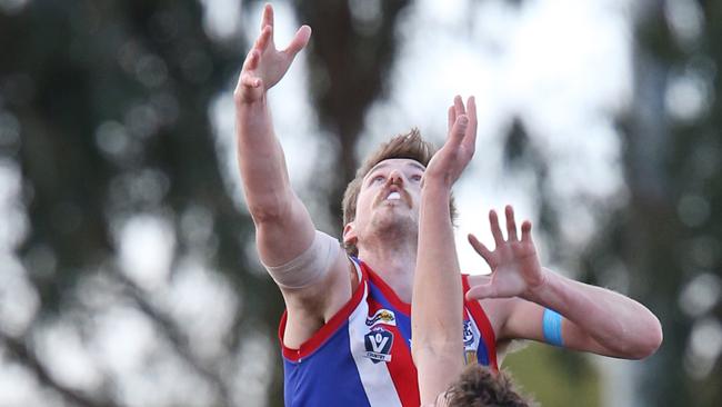 GFL:Senior Football Grovedale v South Barwon. Grovedale 23 Brady Ferguson has South Barwon 6 Luke Davis over him Picture: Mark Wilson